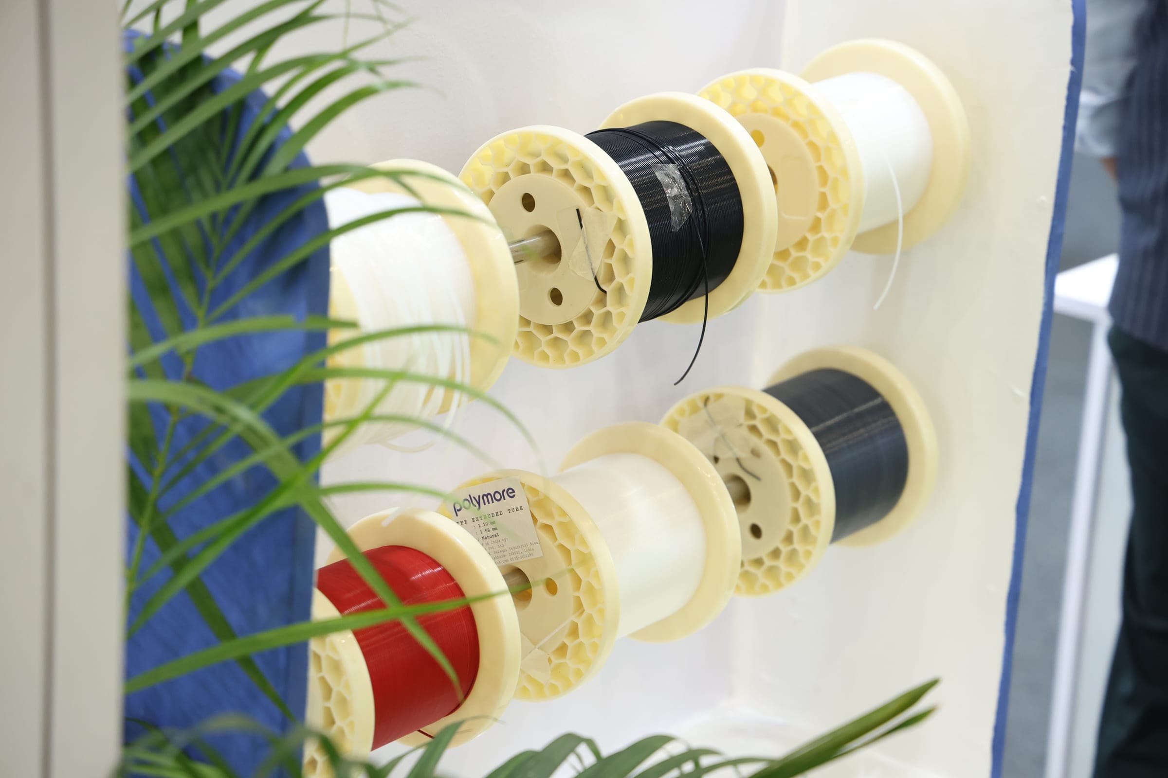 Polymore PTFE tubing spools displayed at India Health 2026