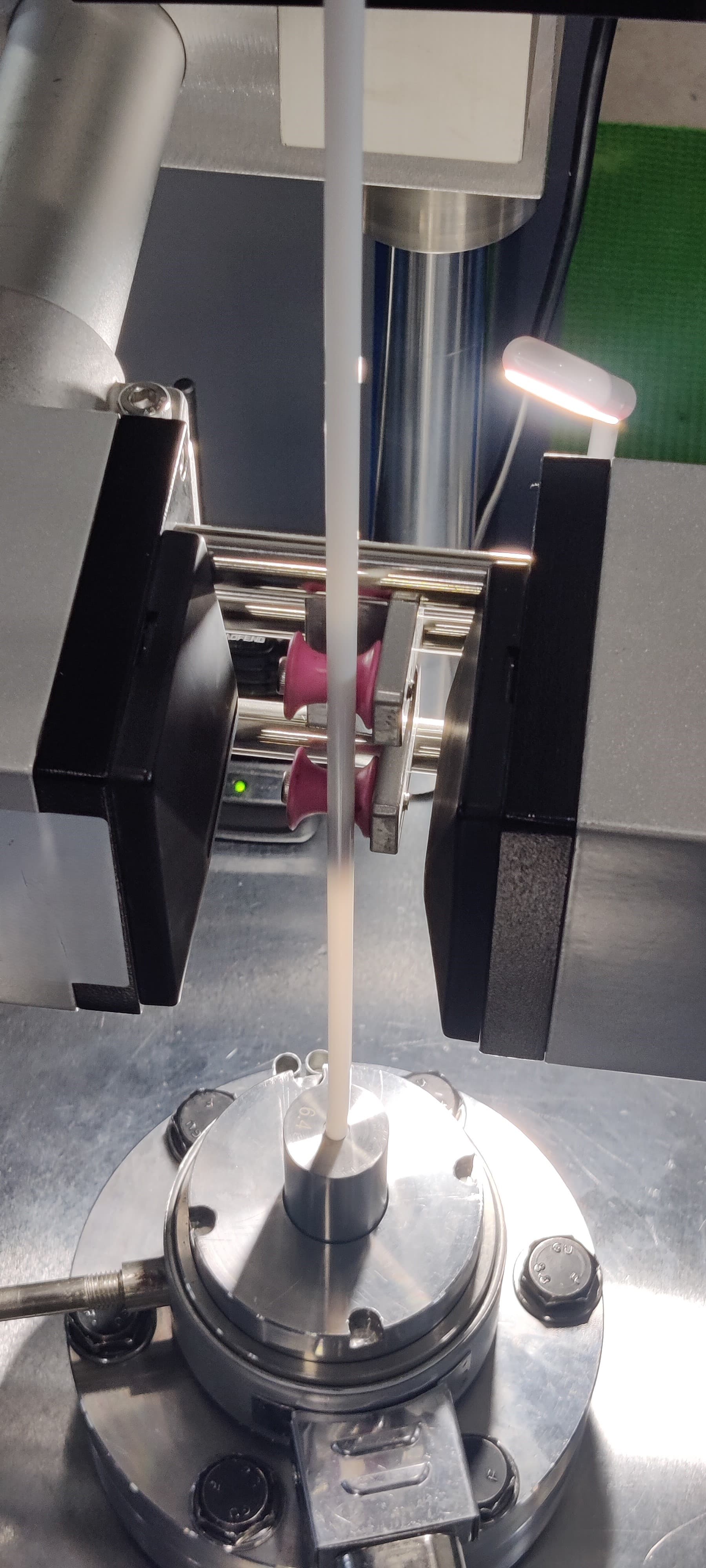 Tensile testing of a PTFE tube sample