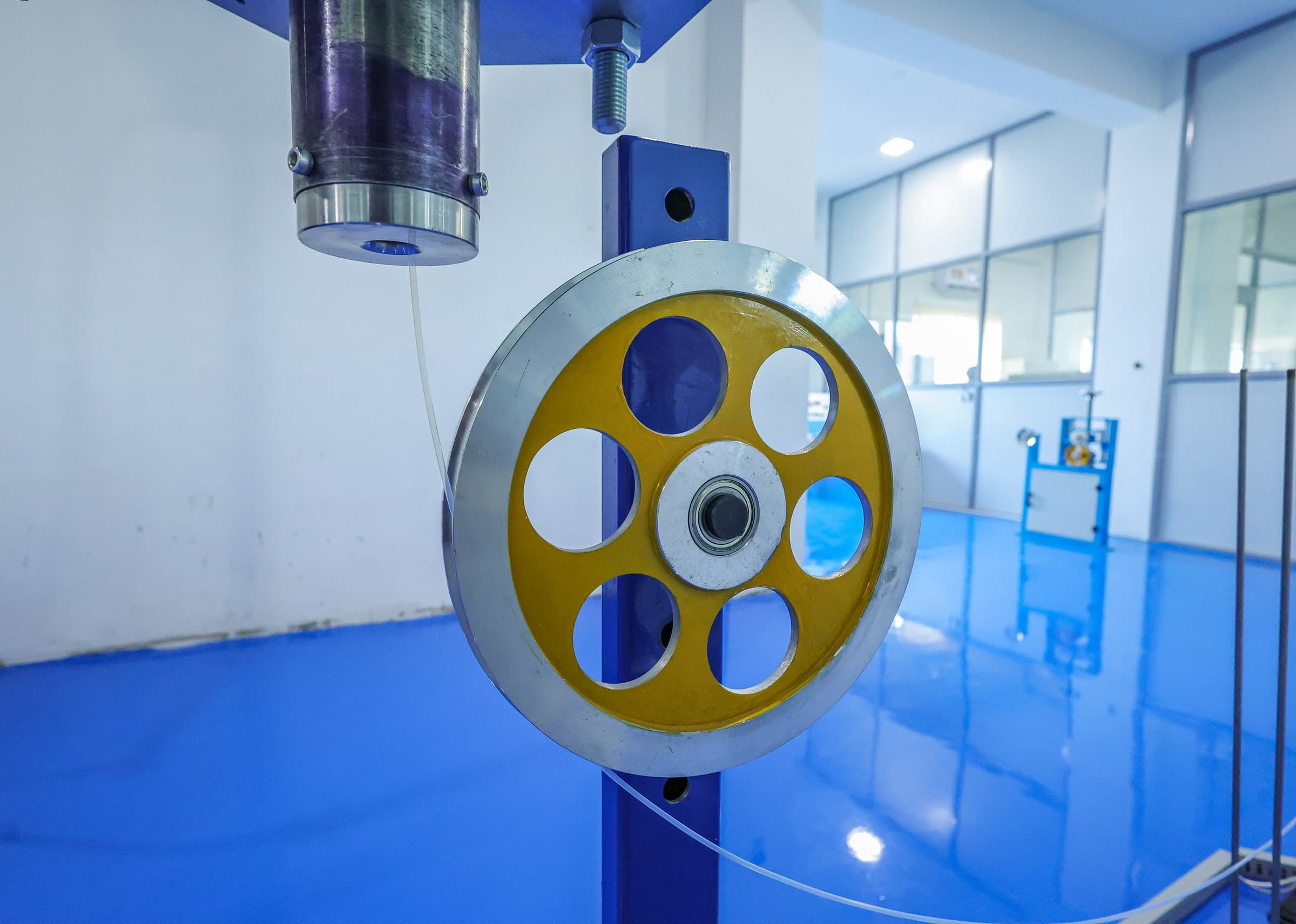 Controlled PTFE tube winding during production